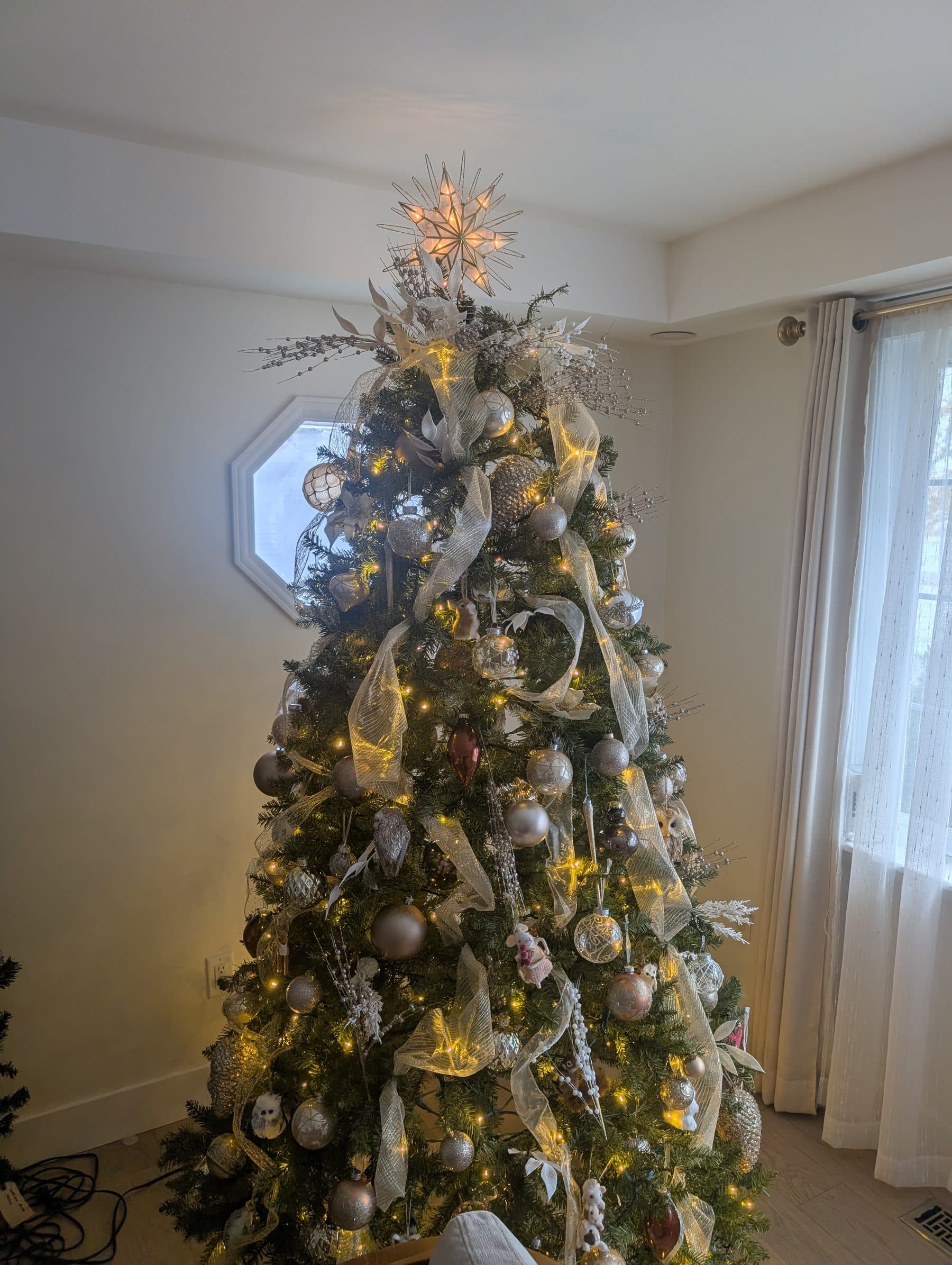 Close-up of an elegant gold and silver decorated Christmas tree