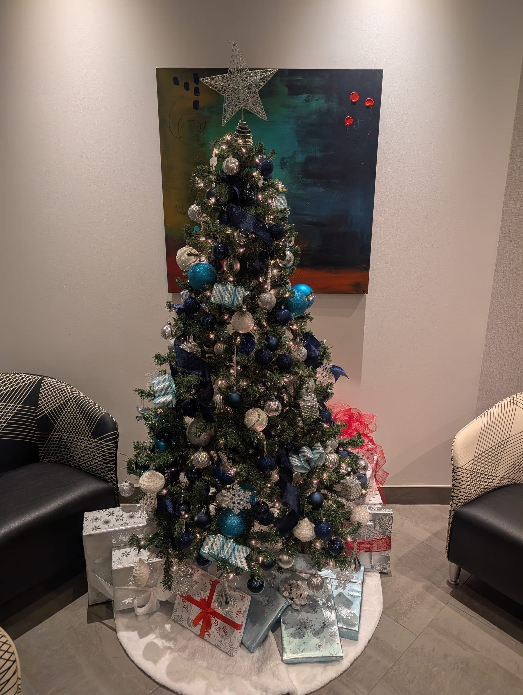 Blue and silver decorated corporate Christmas tree, the look of the Winter Wonderland package